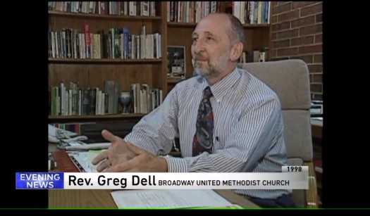 Greg Dell at desk in office at Broadway UMC